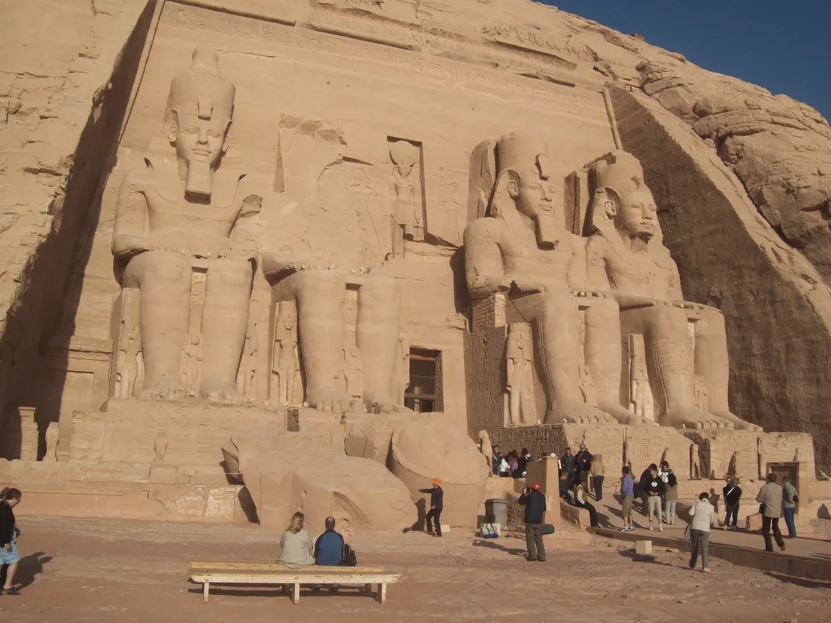 The four seated colossi of Ramesses II on the Great Temple of Abu Simbel, the optional extension of a Nile river cruise from Aswan