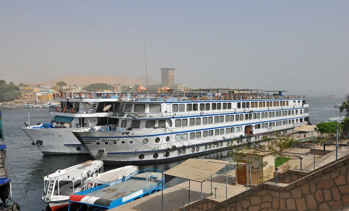 Nile cruise ships moored along the Aswan corniche at the start of a Nile river cruise