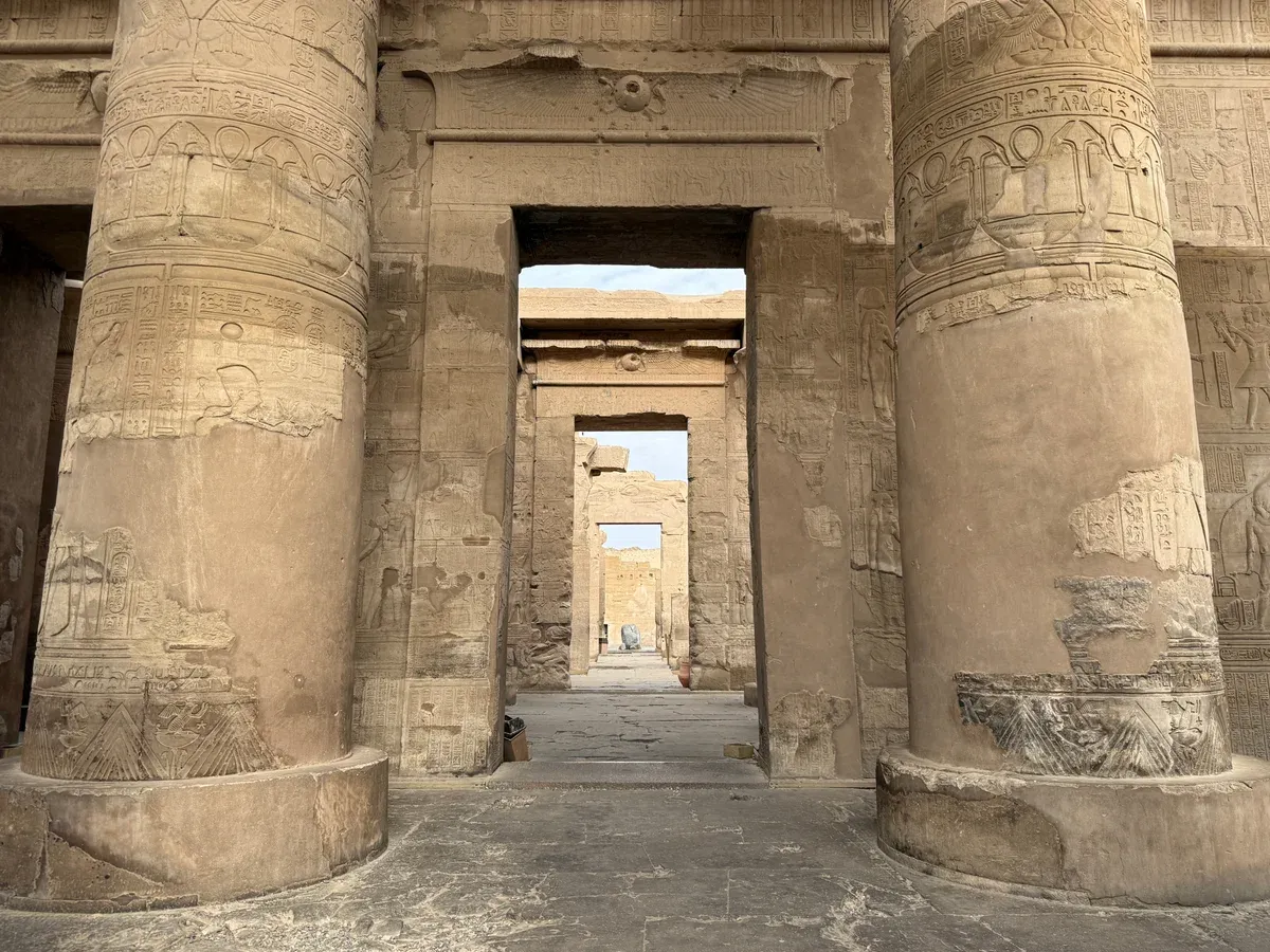 Columns framing the doorways of the double temple at Kom Ombo on a Nile river cruise