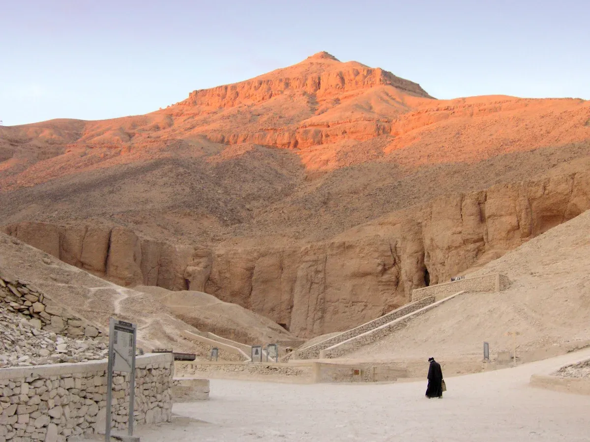The Valley of the Kings below the peak of el-Qurn, visited on a Nile river cruise